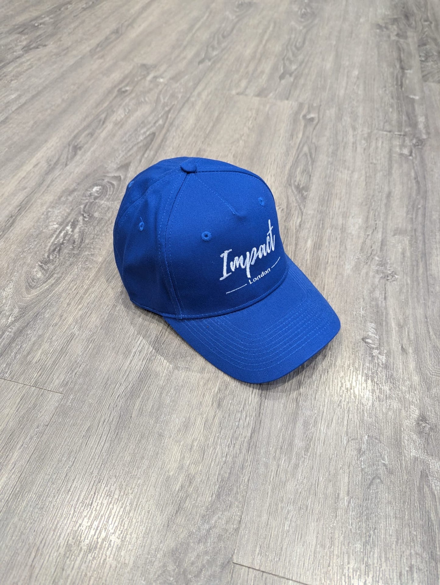 Royal Blue Strapback Cap with White Embroidery Logo