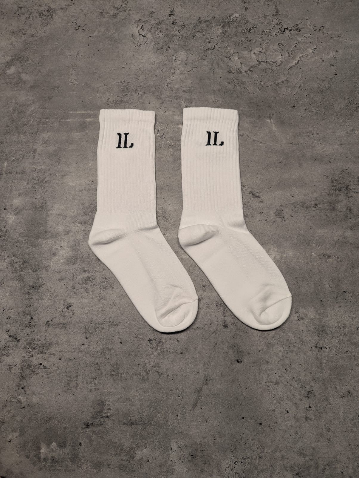 white ankle socks with black Impact London logo