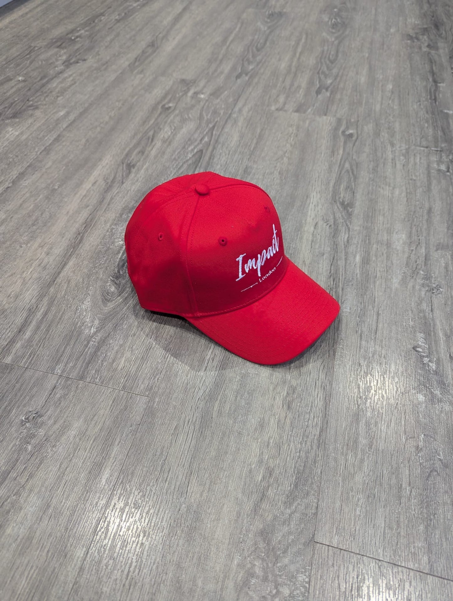 Red Strapback Cap with White Embroidered Logo