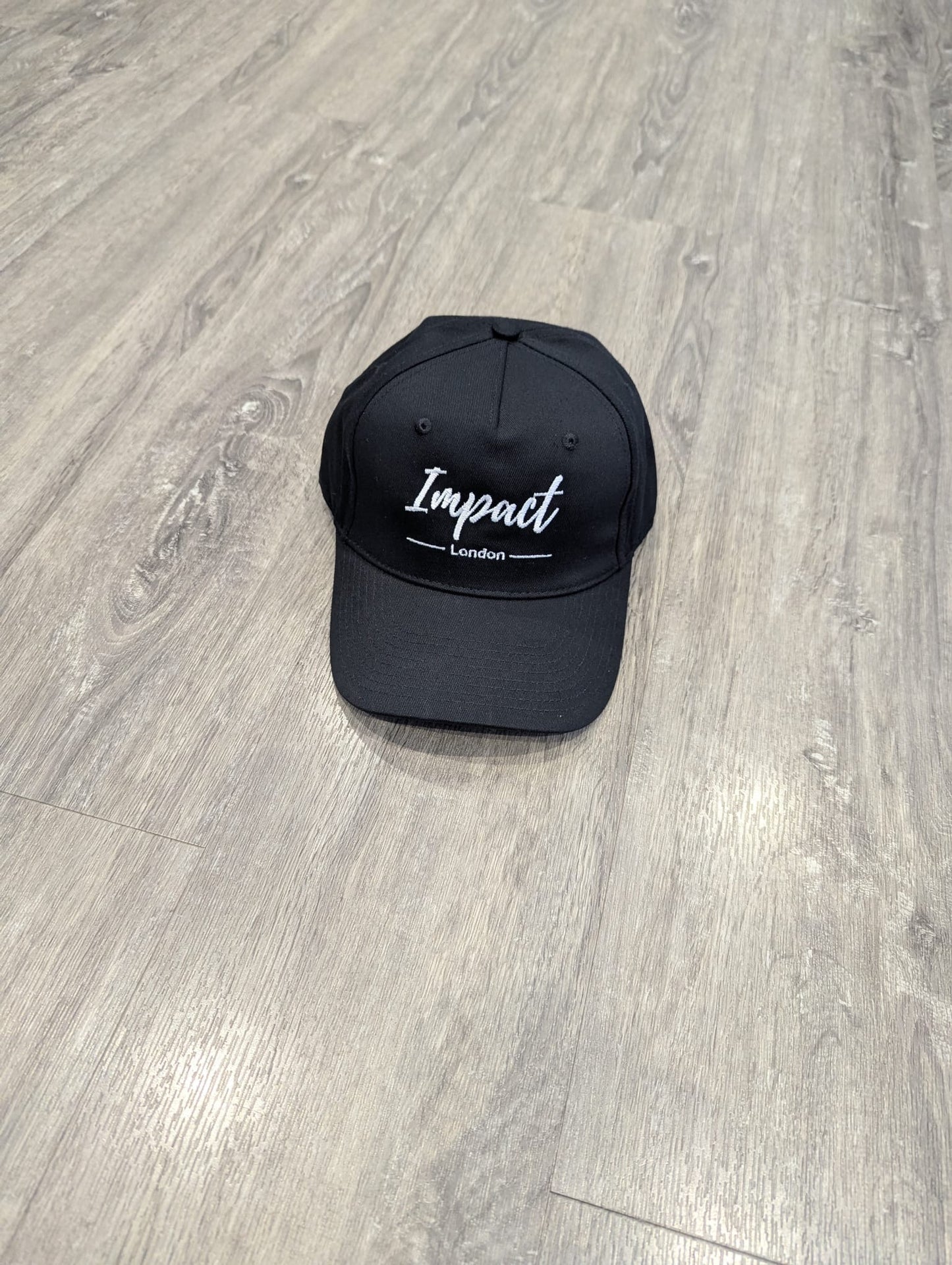 Black Strapback Cap with White Embroidery Logo