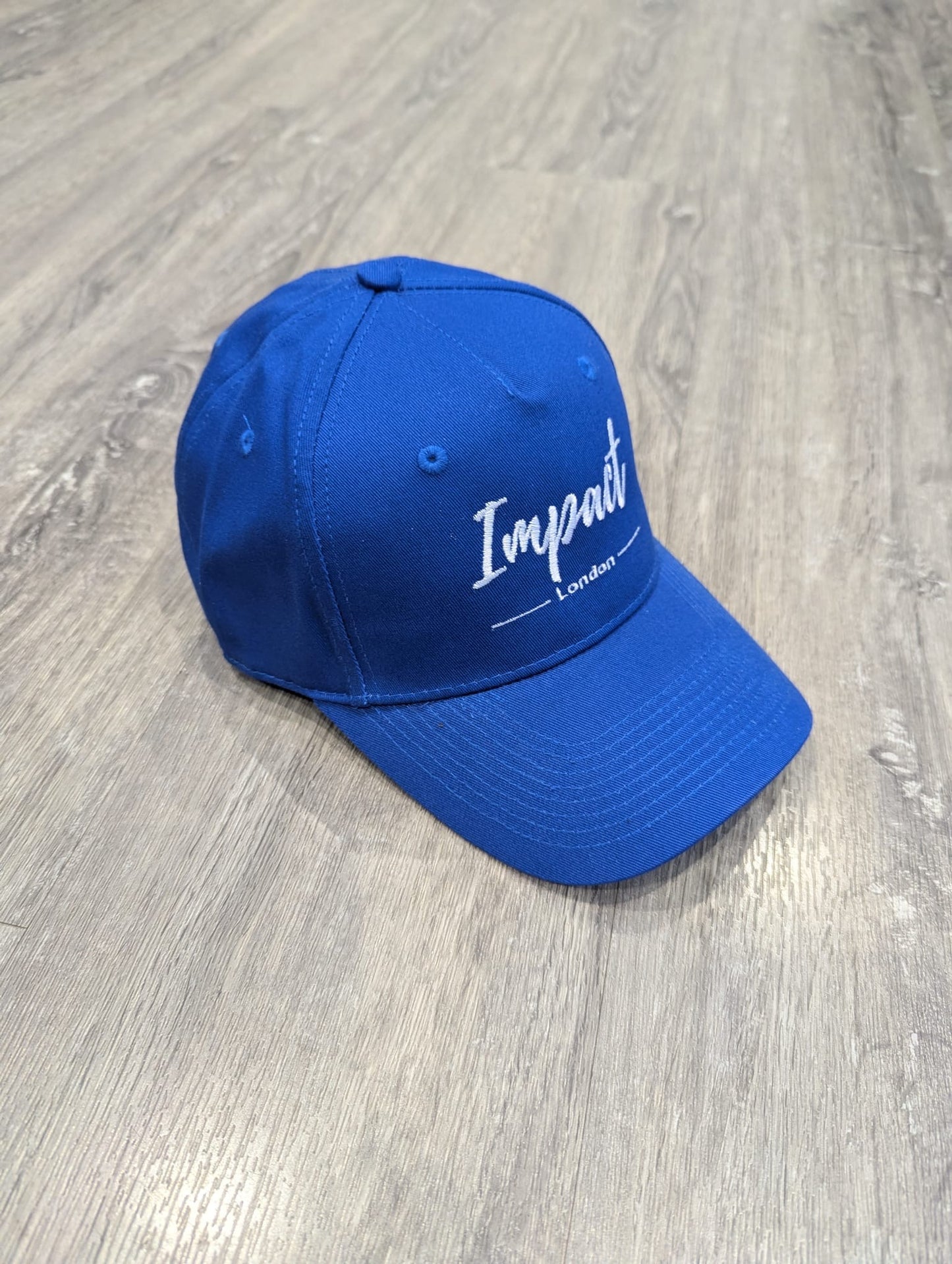 Royal Blue Strapback Cap with White Embroidery Logo