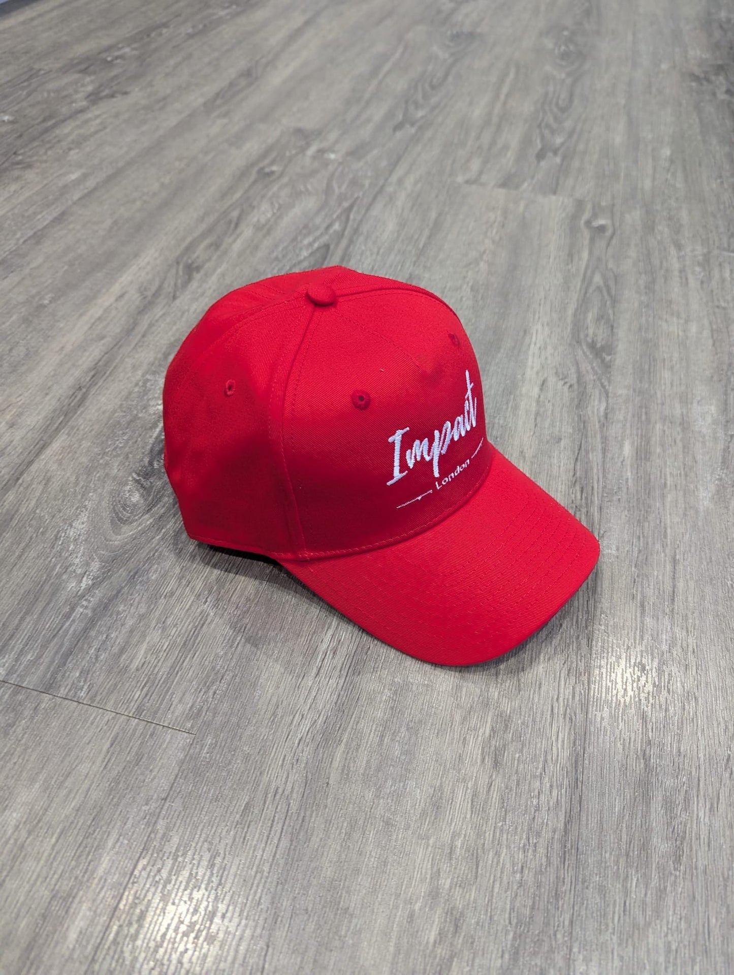 Red Strapback Cap with White Embroidered Logo