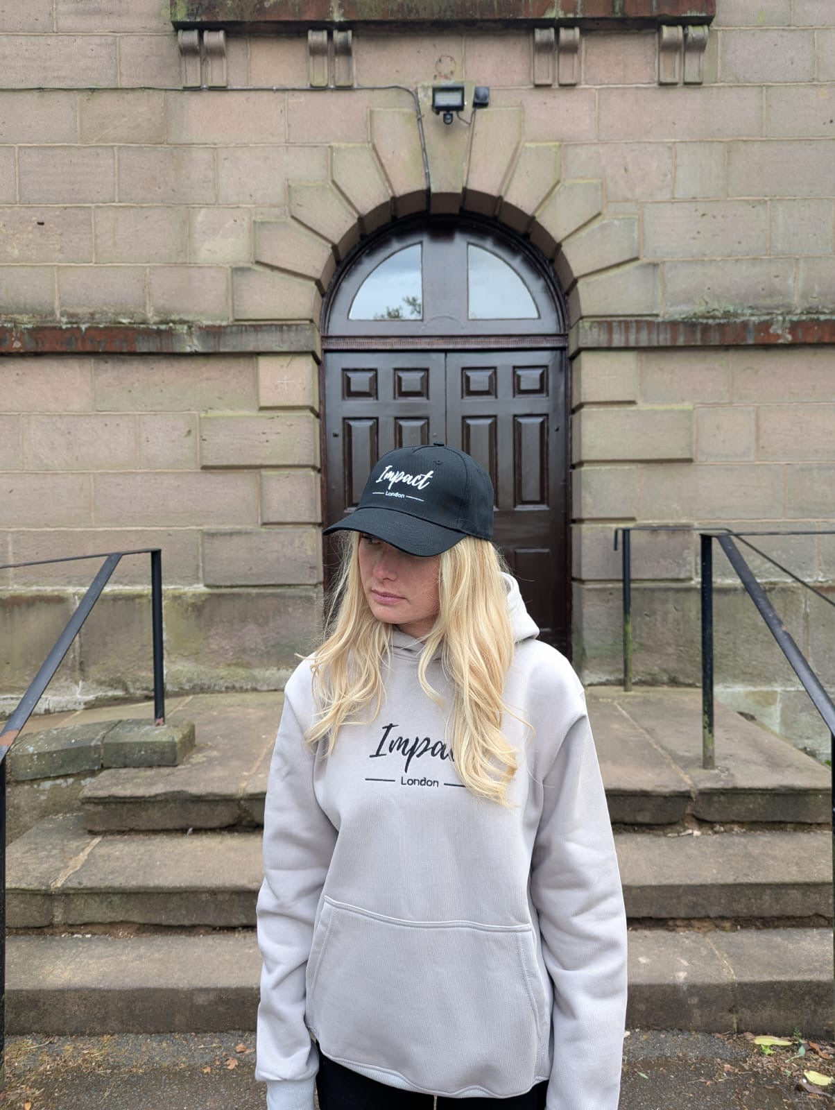 Black Strapback Cap with White Embroidery Logo