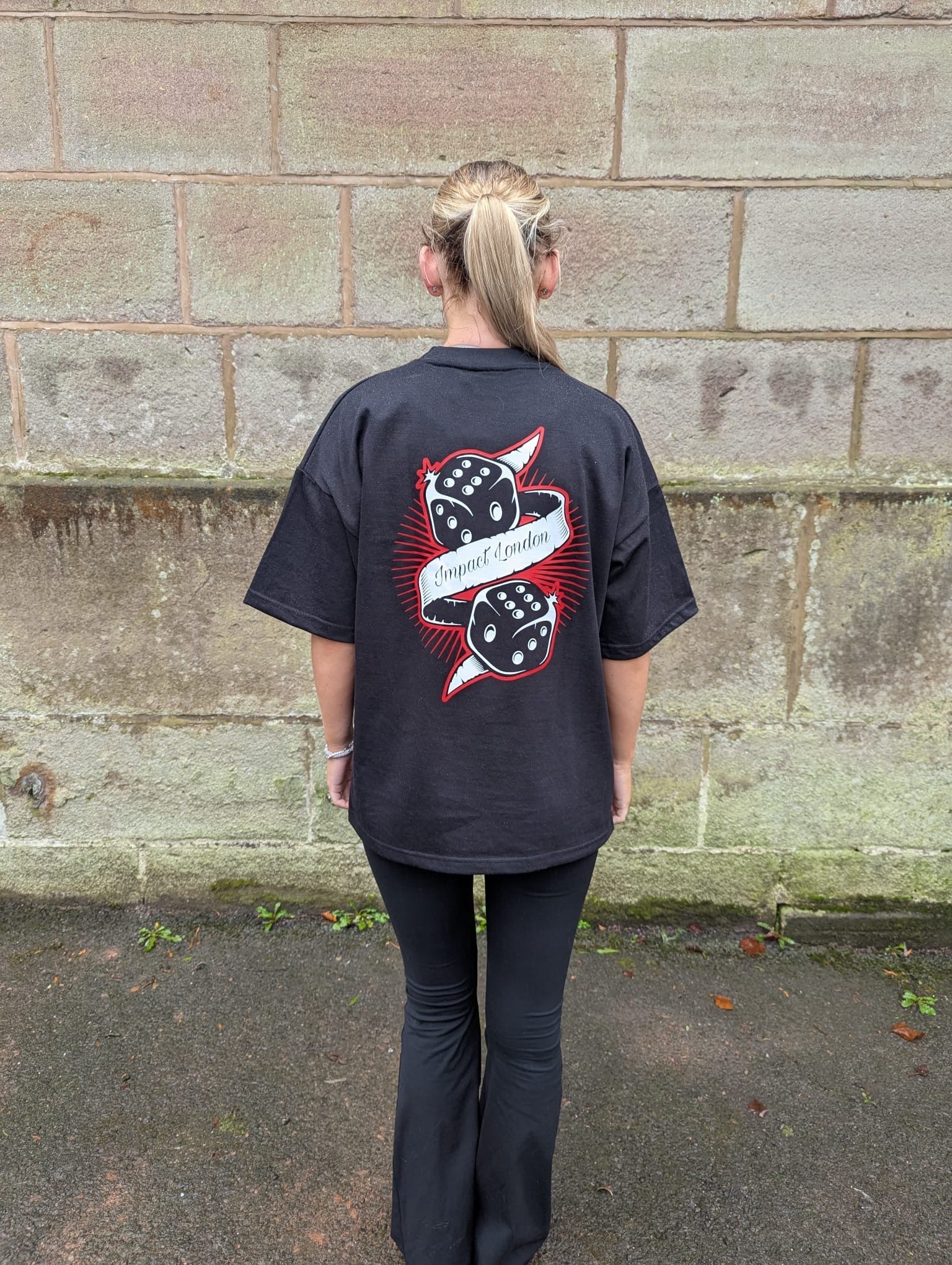 Back of the printed diced logo to the black unisex t-shirt