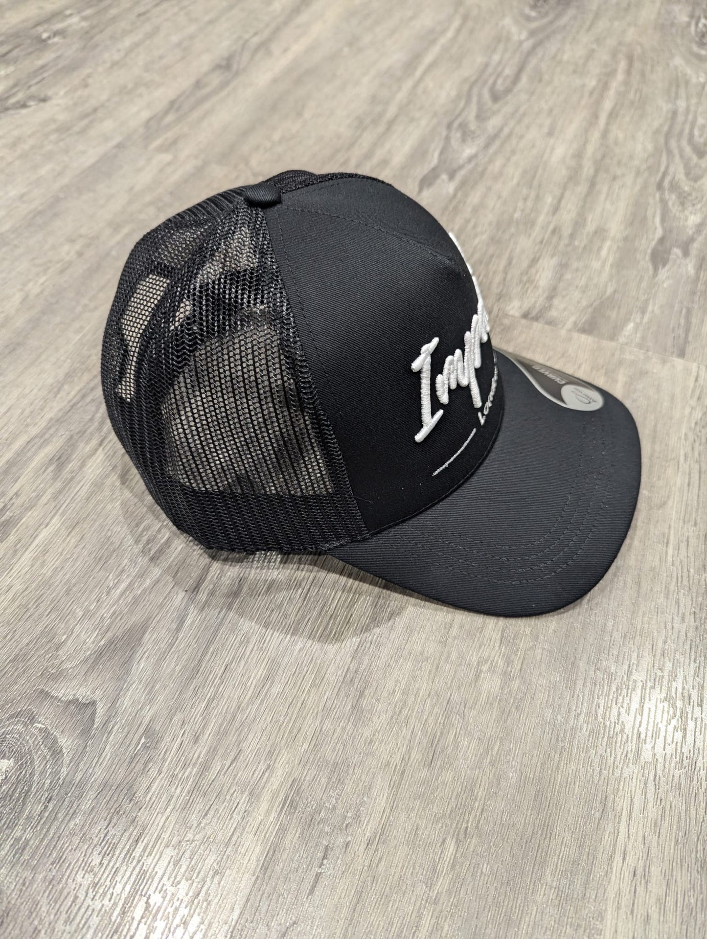 Black Trucker Cap with White 3D Logo