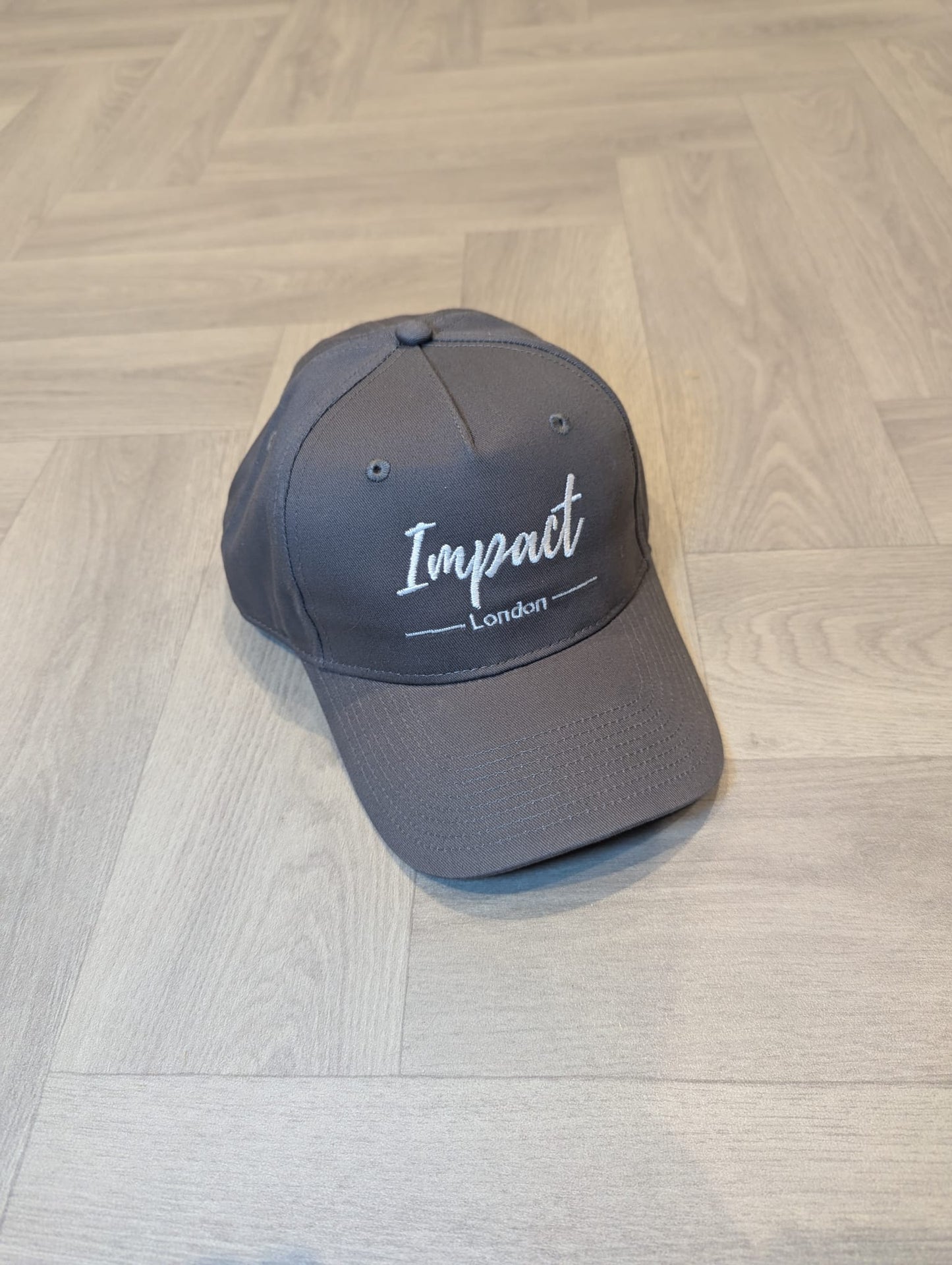 Dark Grey Strapback Cap with White Embroidery Logo
