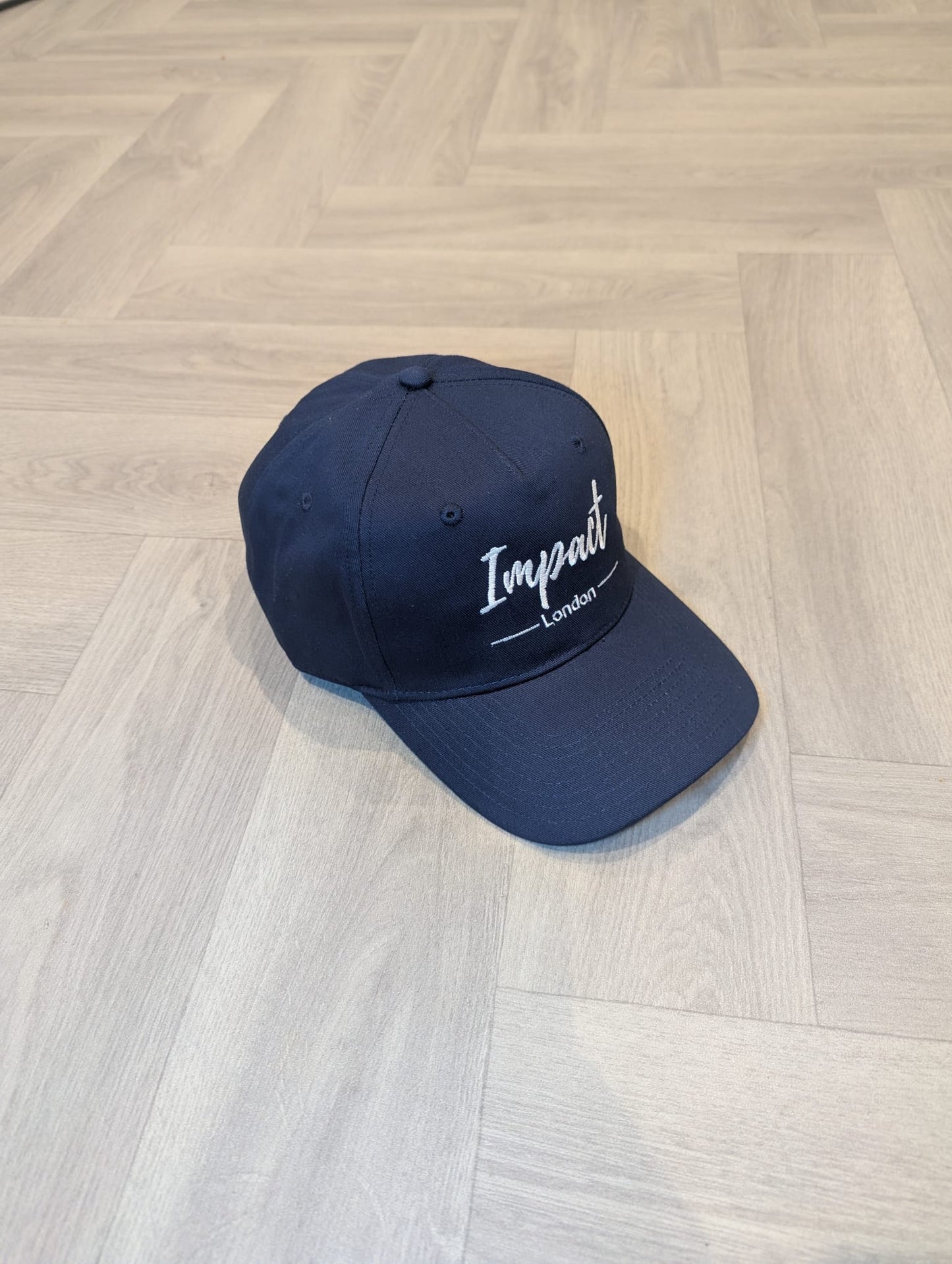 Navy Strapback Cap with White Embroidery Logo