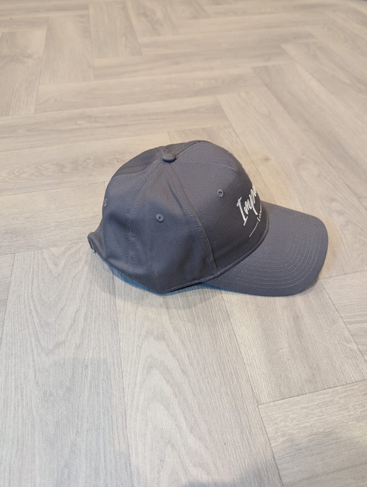 Dark Grey Strapback Cap with White Embroidery Logo